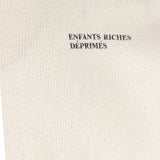 Tan shirt, back view