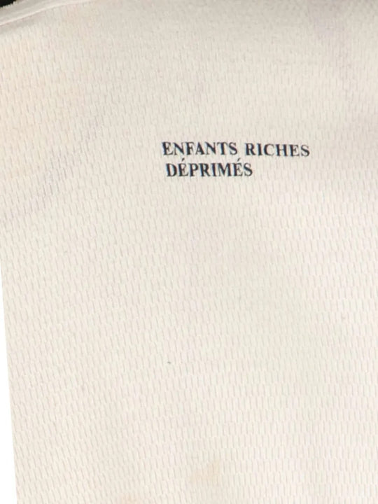 Tan shirt, back view