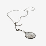 Grey jewelry, side view