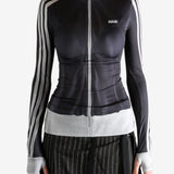 black jacket worn by a person, showing the jacket fit