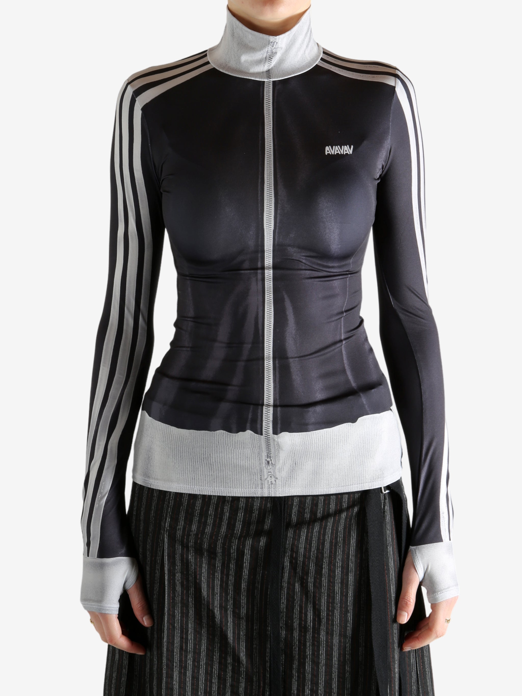 black jacket worn by a person, showing the jacket fit