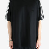 Black t-shirt worn by a person, showing the shirt's fit