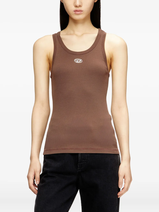 Brown top worn by a person, showing the top fit