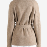 Tan jacket worn by a person, showing the jacket fit