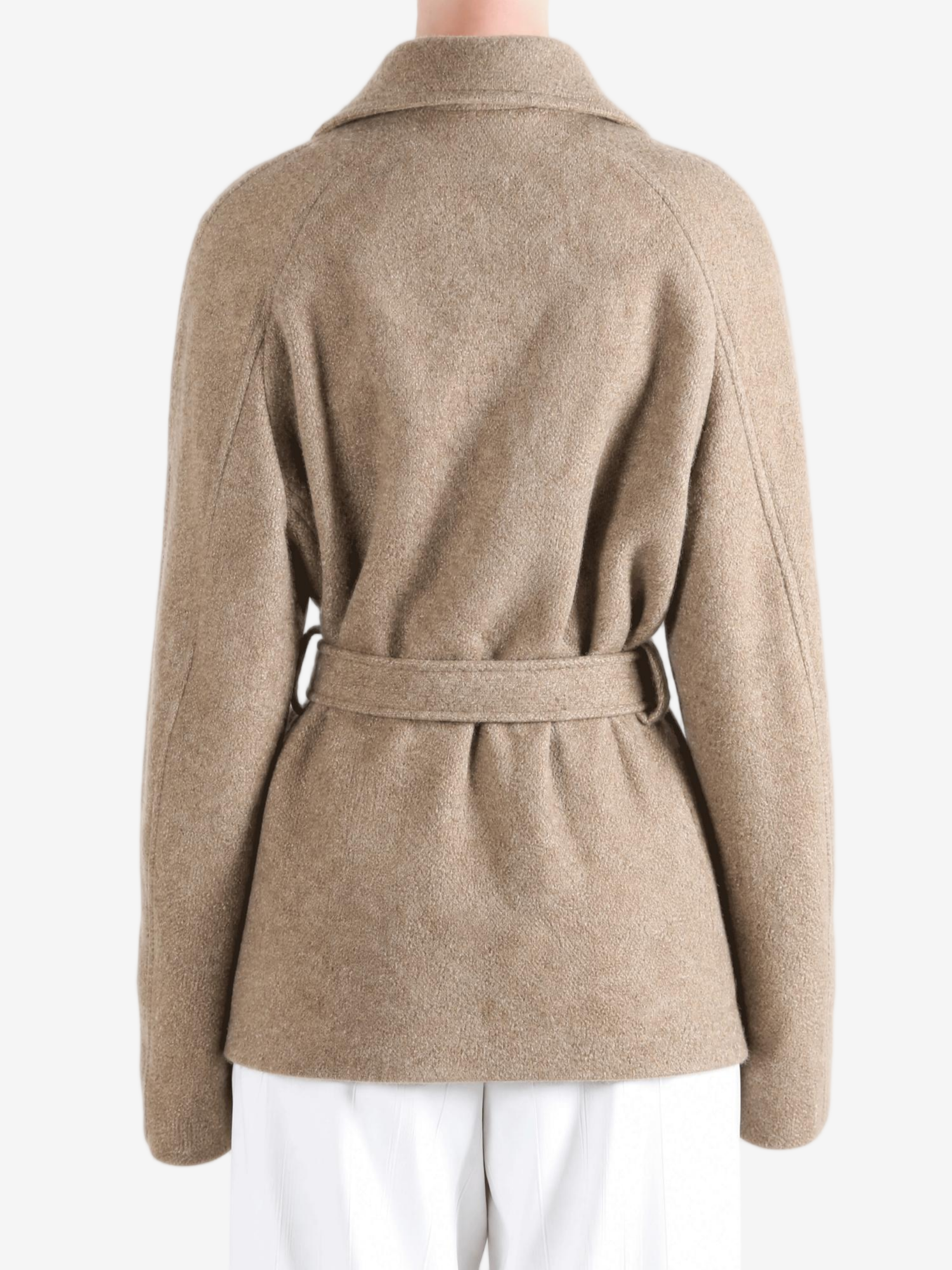Tan jacket worn by a person, showing the jacket fit