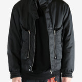 Black jacket worn by a person, showing the jacket's fit