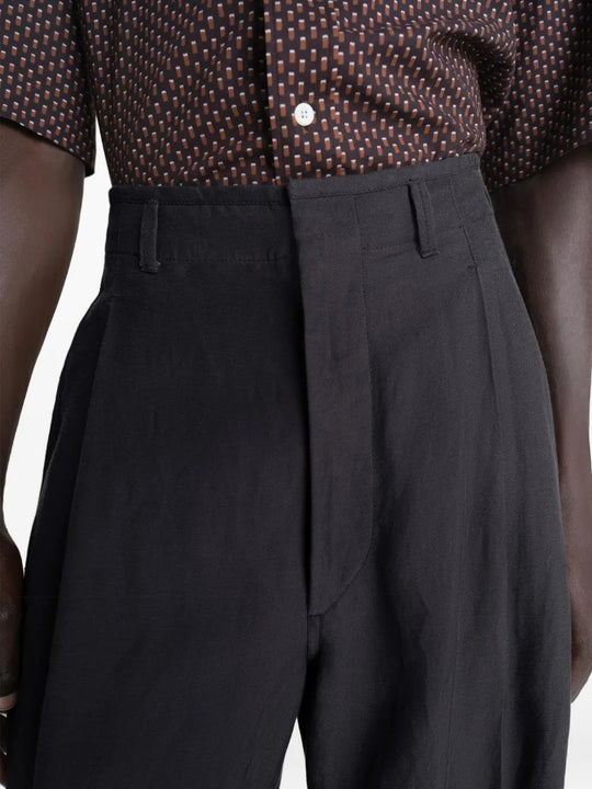 Close up of black pants, showing texture of the viscose and flax fabric