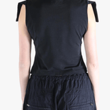 Black t-shirt worn by a person, showing the t-shirt's fit