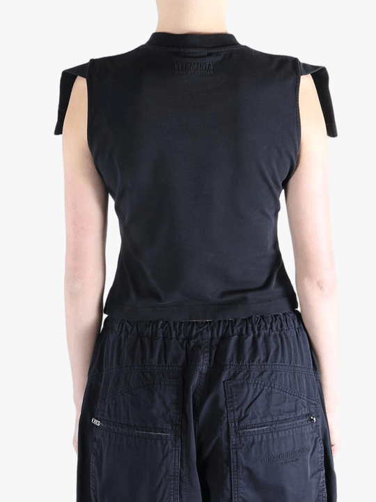 Black t-shirt worn by a person, showing the t-shirt's fit