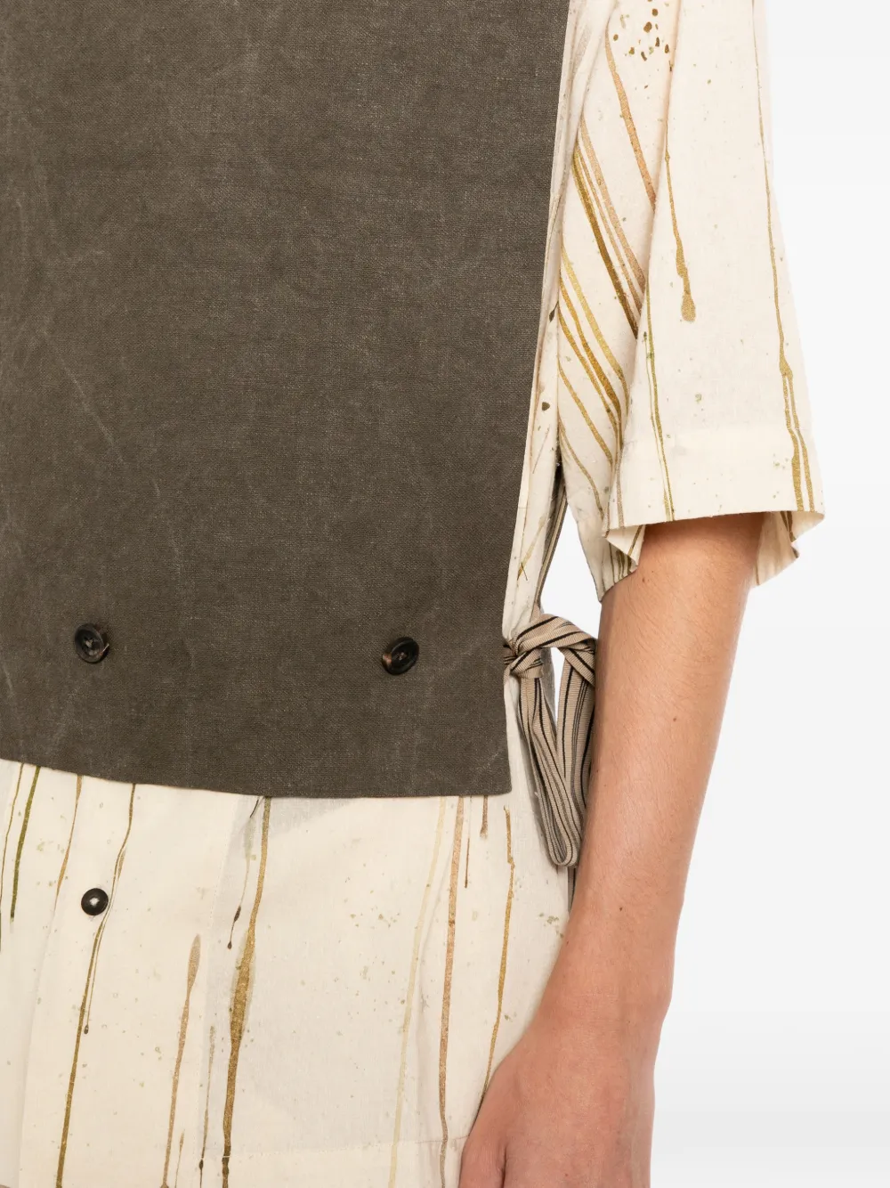 Close up of Brown vest, showing texture of the Flax/Linen fabric