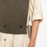 Close up of Brown vest, showing texture of the Flax/Linen fabric