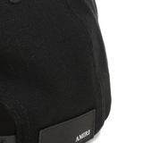 Close up of black hat, showing texture of the Cotton fabric