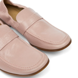 Close up of pink loafers, showing texture of the Calf Leather fabric