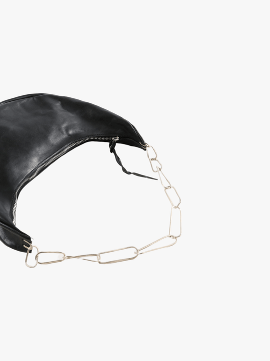 Close-up of black bag, showing texture of the fabric