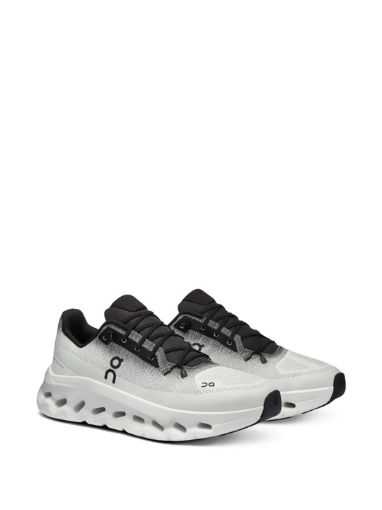 Grey sneakers, side view