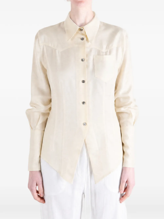 Tan shirt worn by a person, showing the shirt fit