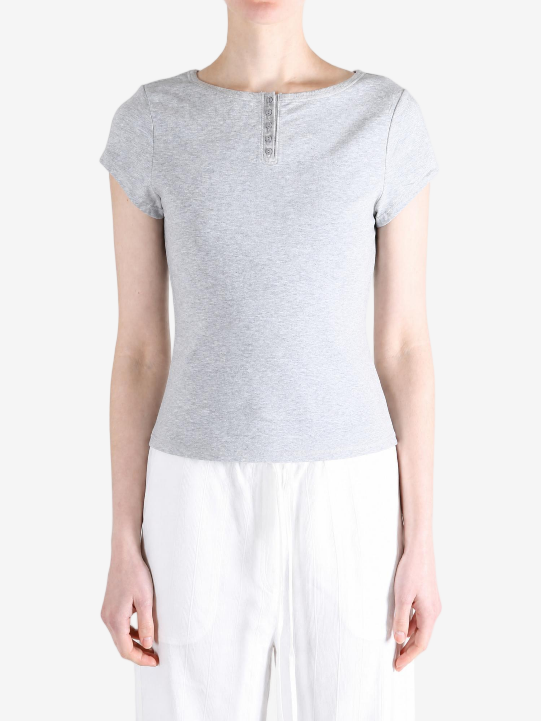 Grey shirt worn by a person, showing the shirt fit