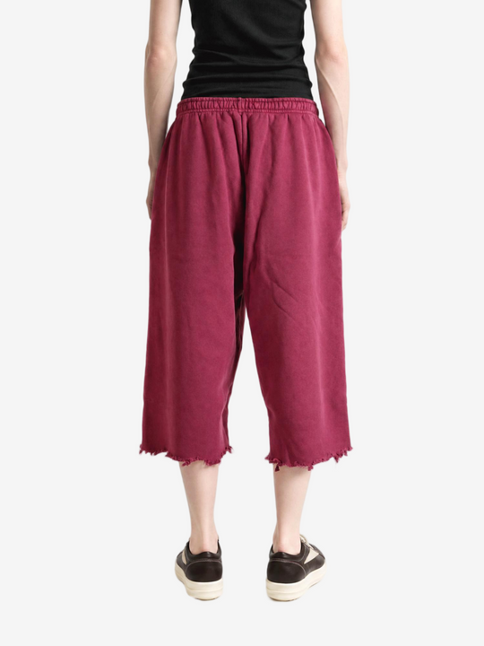 Burgundy pants, full body view