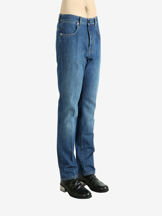 Blue pants worn by a person, showing the pants fit