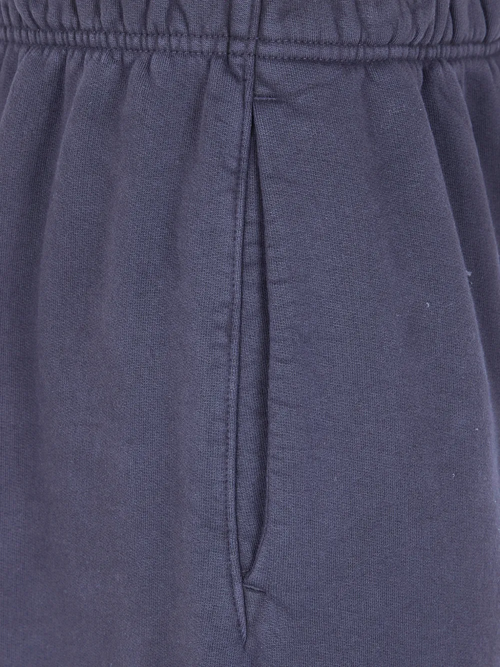 Close up of blue pants, showing texture of the Cotton fabric