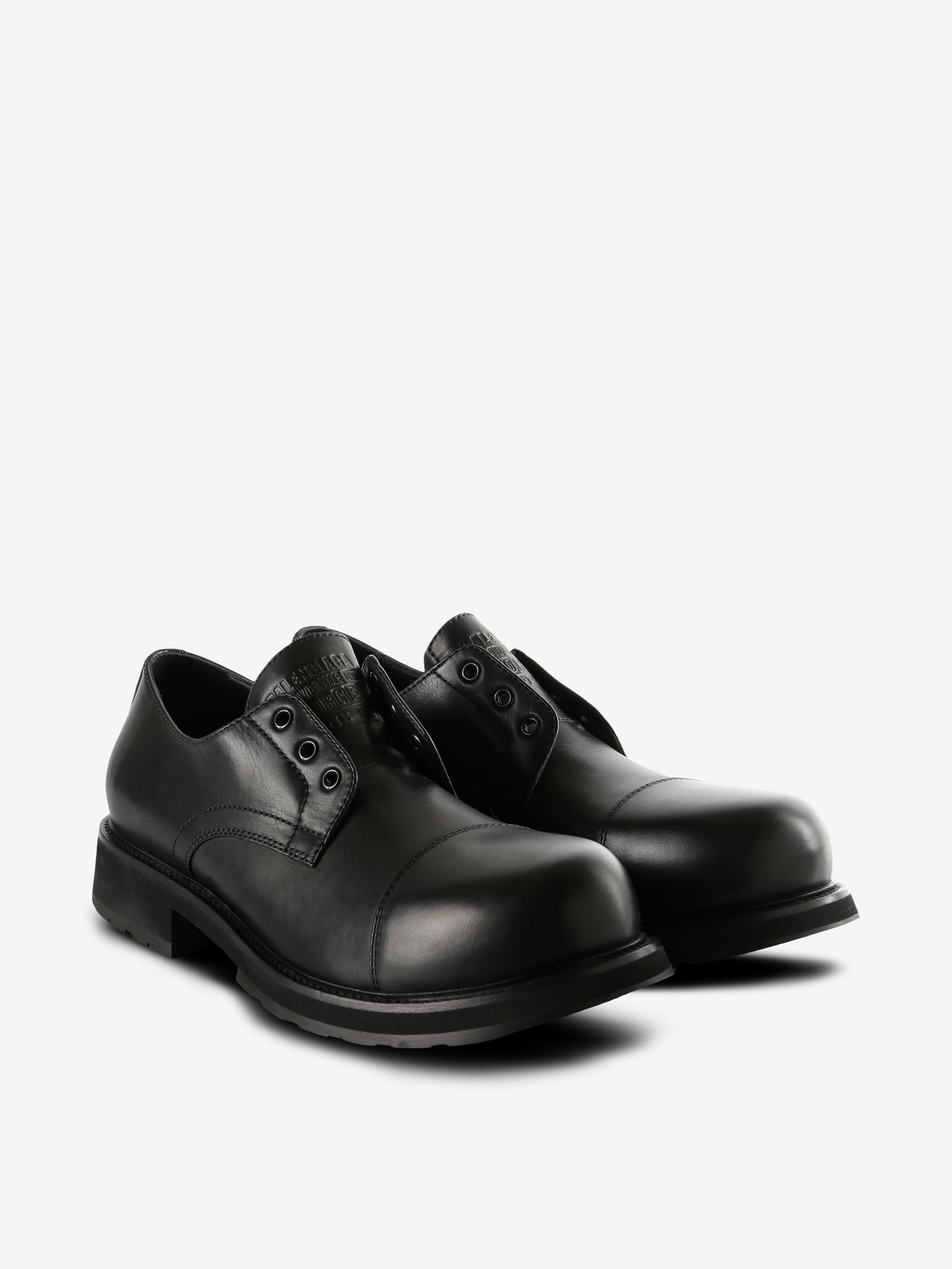 Black derbys, side view