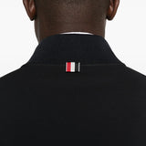 Black jacket worn by a person, showing the jacket fit