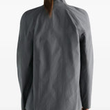 Grey dress worn by a person, showing the dress fit