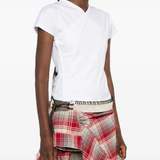 White top worn by a person, showing the top fit