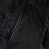 Close up of black pants, showing texture of the cotton fabric
