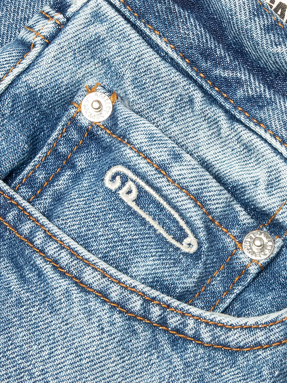 Close up of blue jeans, showing texture of the cotton fabric