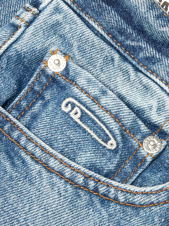 Close up of blue jeans, showing texture of the cotton fabric