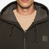Brown jacket worn by a person, showing the jacket fit
