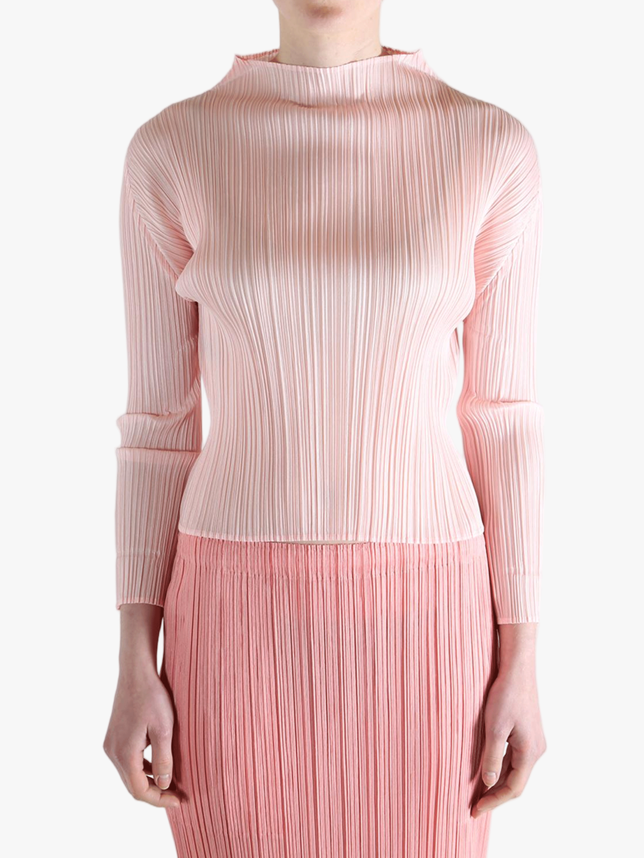 Pink shirt worn by a person, showing the shirt's fit