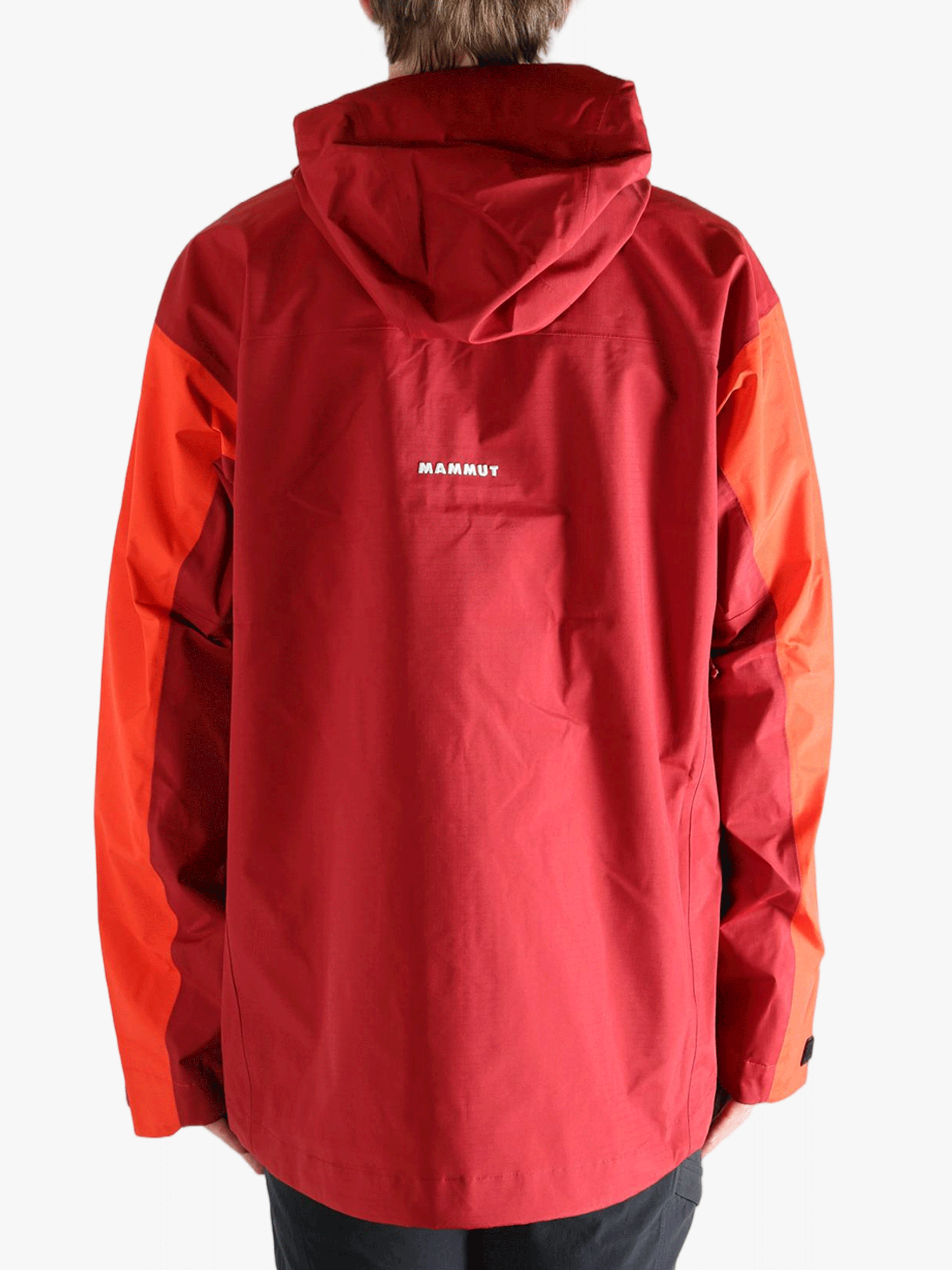 Red and orange jacket worn by a person, showing the jacket fit