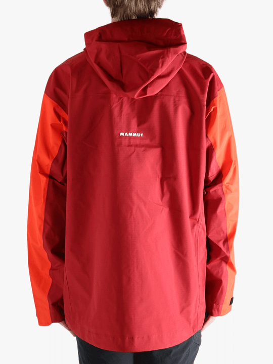Red and orange jacket worn by a person, showing the jacket fit