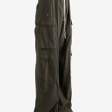 Brown pants worn by a person, showing the pants's fit