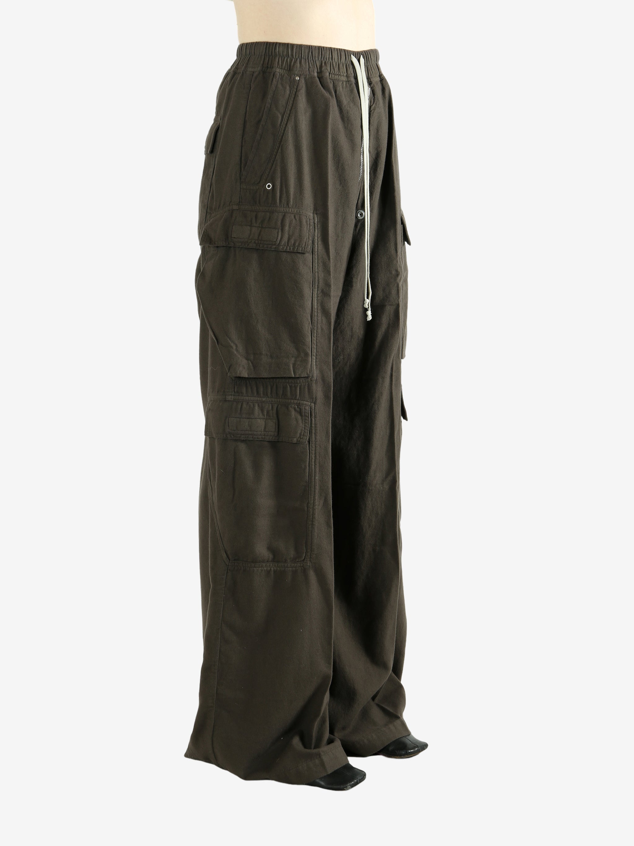 Brown pants worn by a person, showing the pants's fit