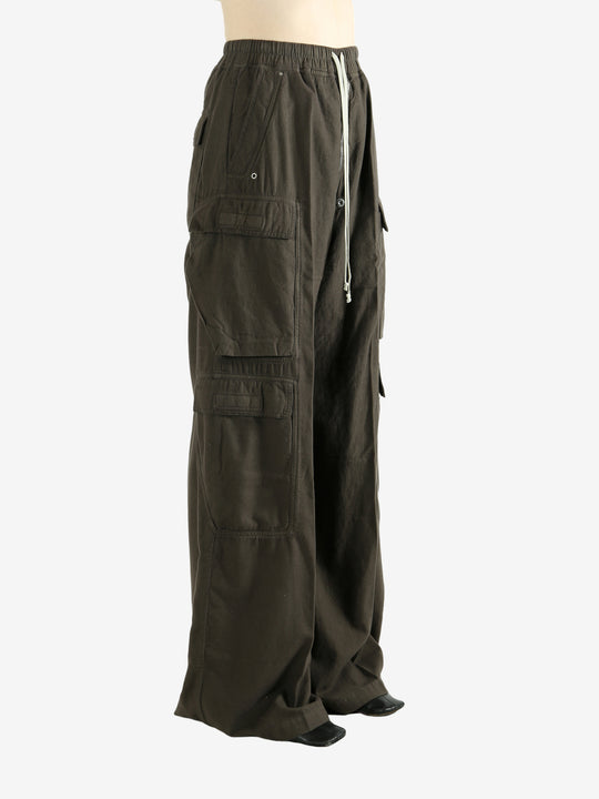 Brown pants worn by a person, showing the pants's fit