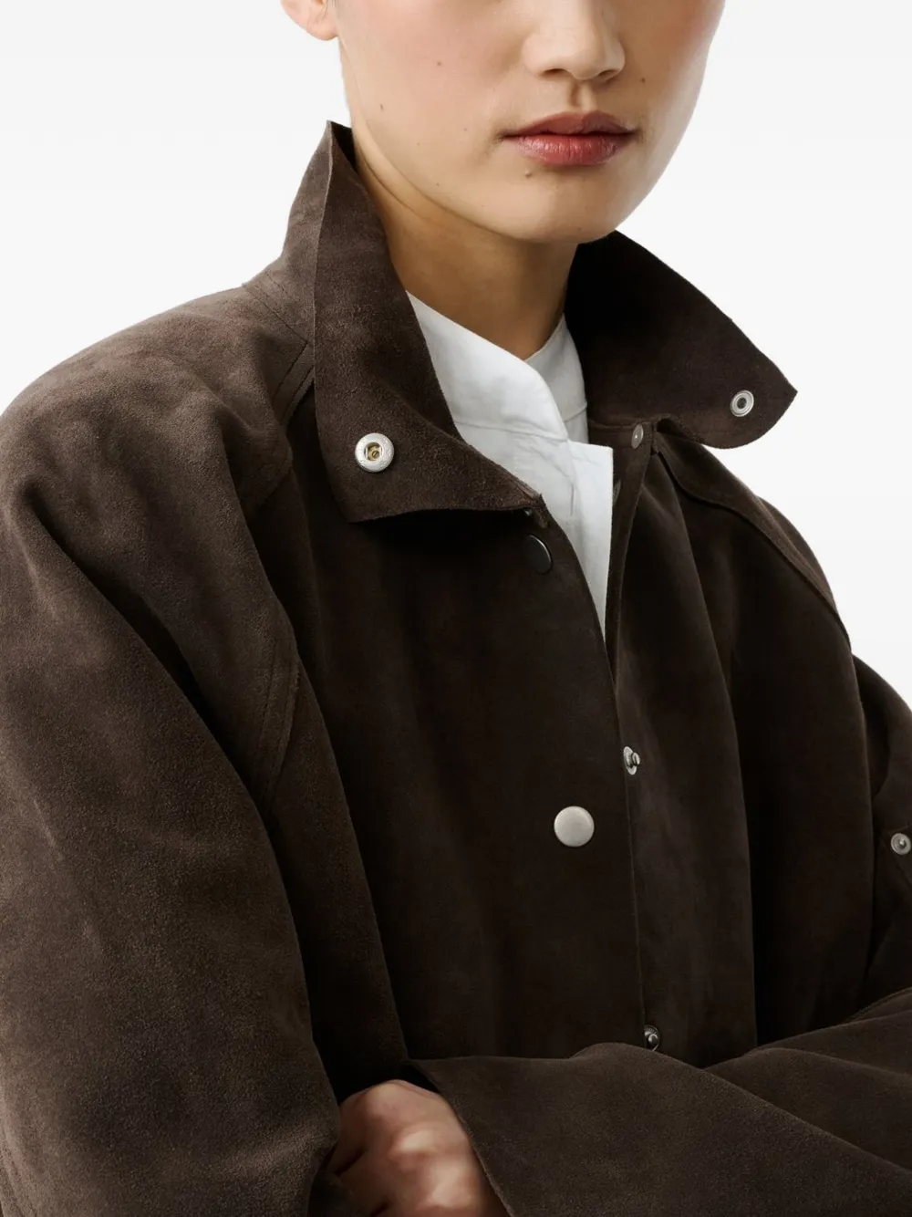 Close-up of Brown jacket，showing texture of the 100% cow leather fabric