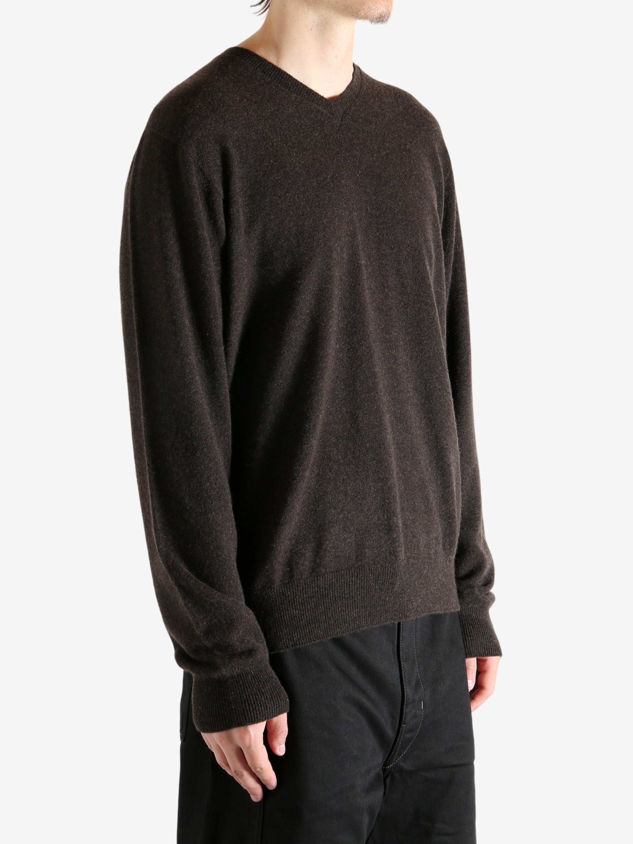 Brown sweater worn by a person, showing the sweater&#39;s fit