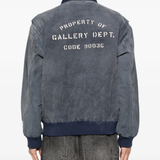 Blue jacket worn by a person, showing the jacket fit