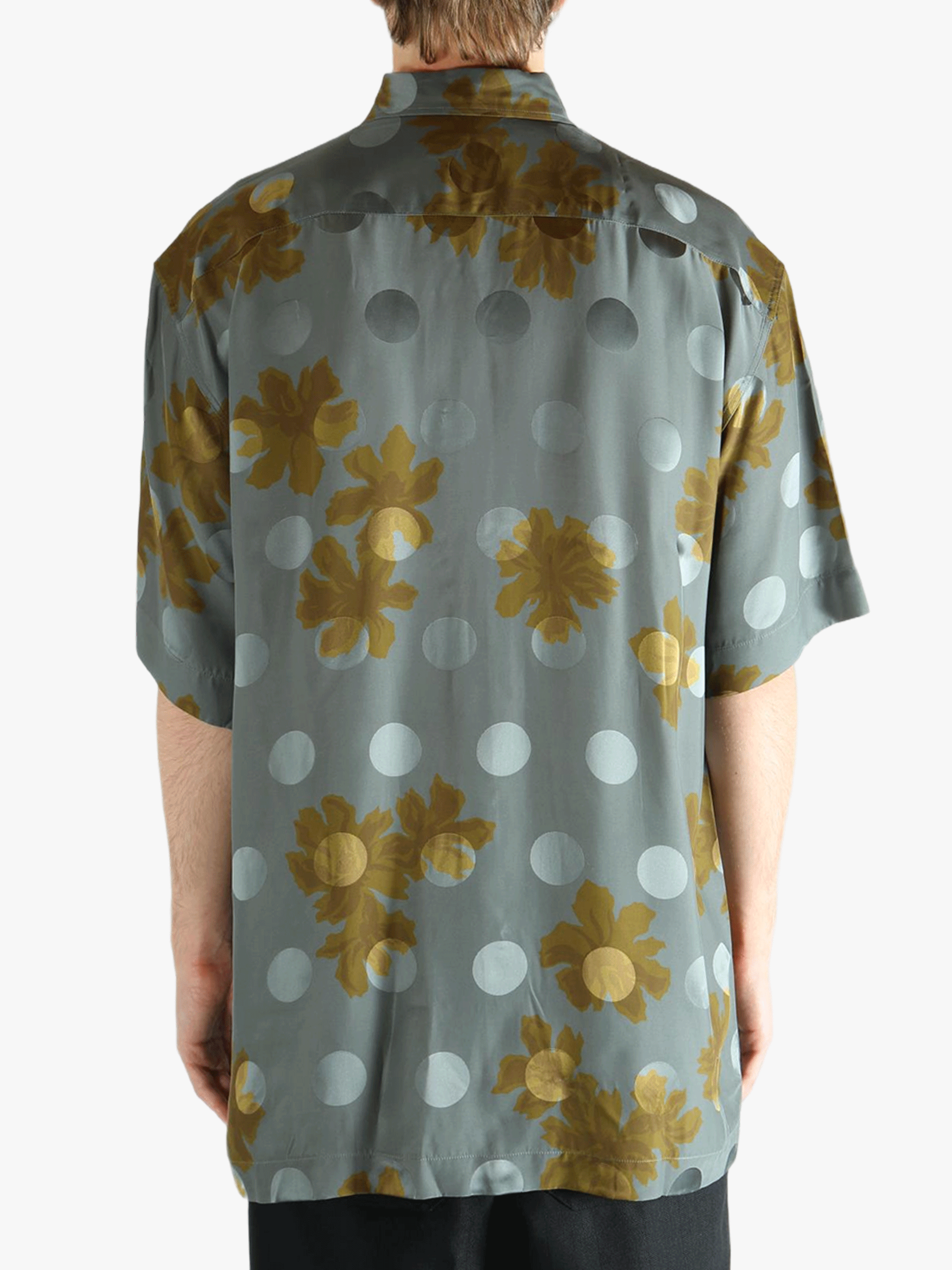 Navy shirt worn by a person, showing the shirt's fit