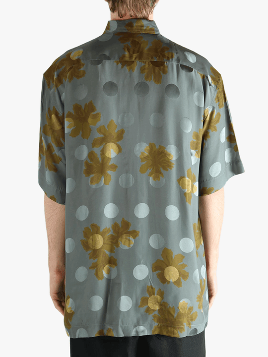Navy shirt worn by a person, showing the shirt's fit
