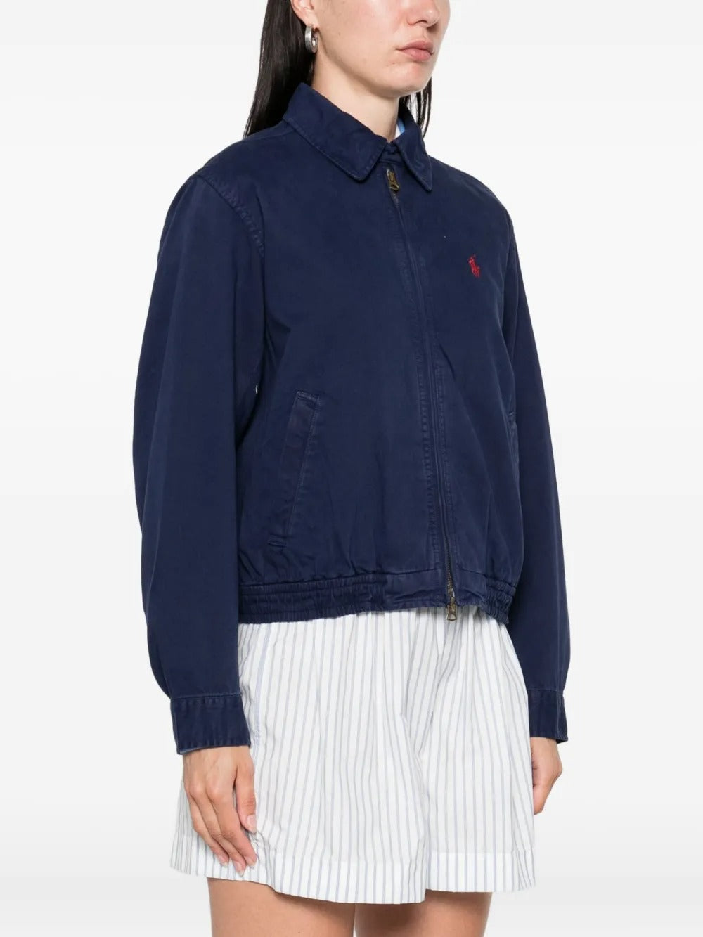 Navy jacket worn by a person, showing the jacket's fit