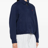 Navy jacket worn by a person, showing the jacket's fit