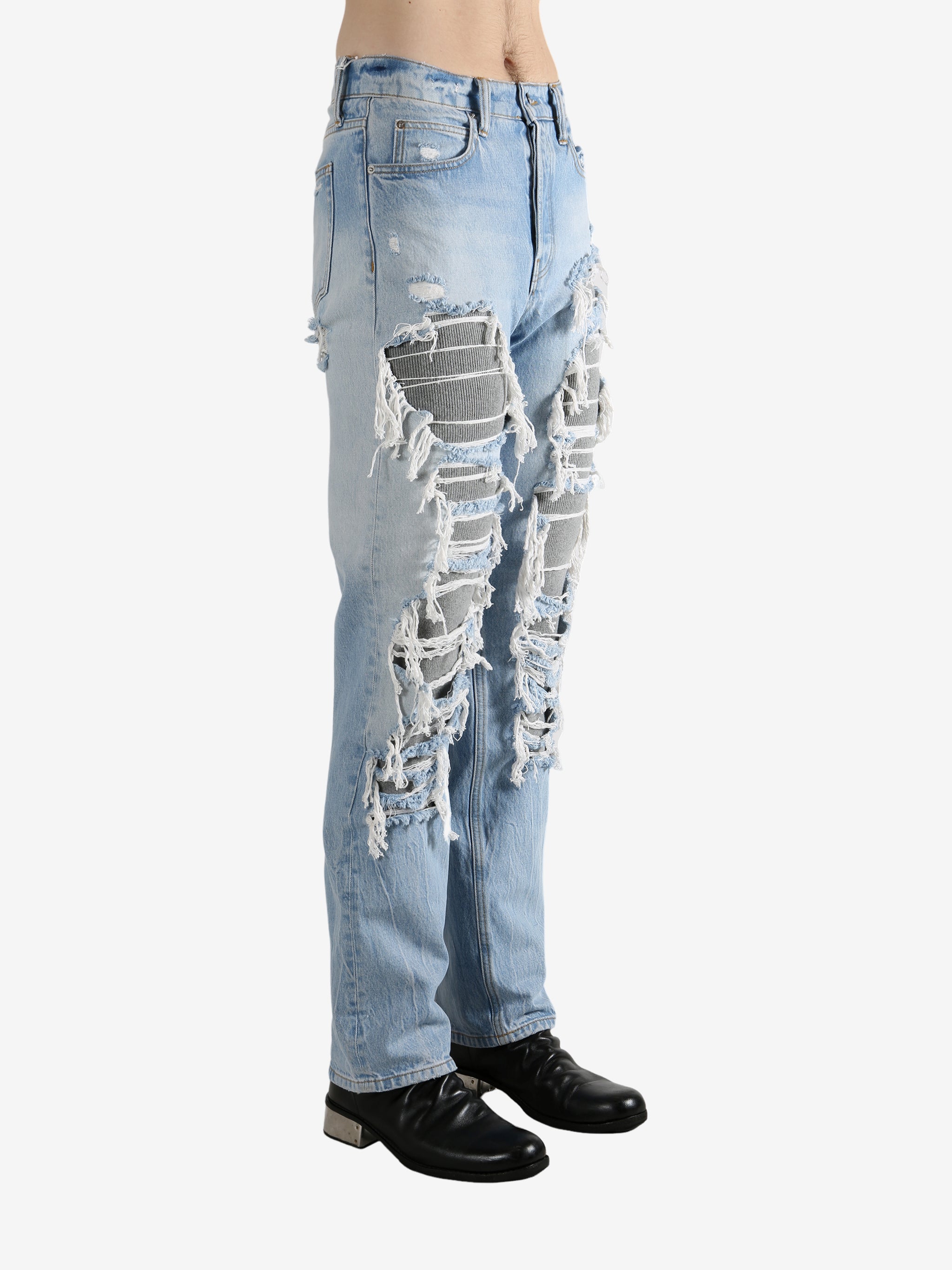 Blue jeans worn by a person, showing the jeans fit