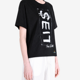 Black t-shirt worn by a person, showing the t-shirt fit