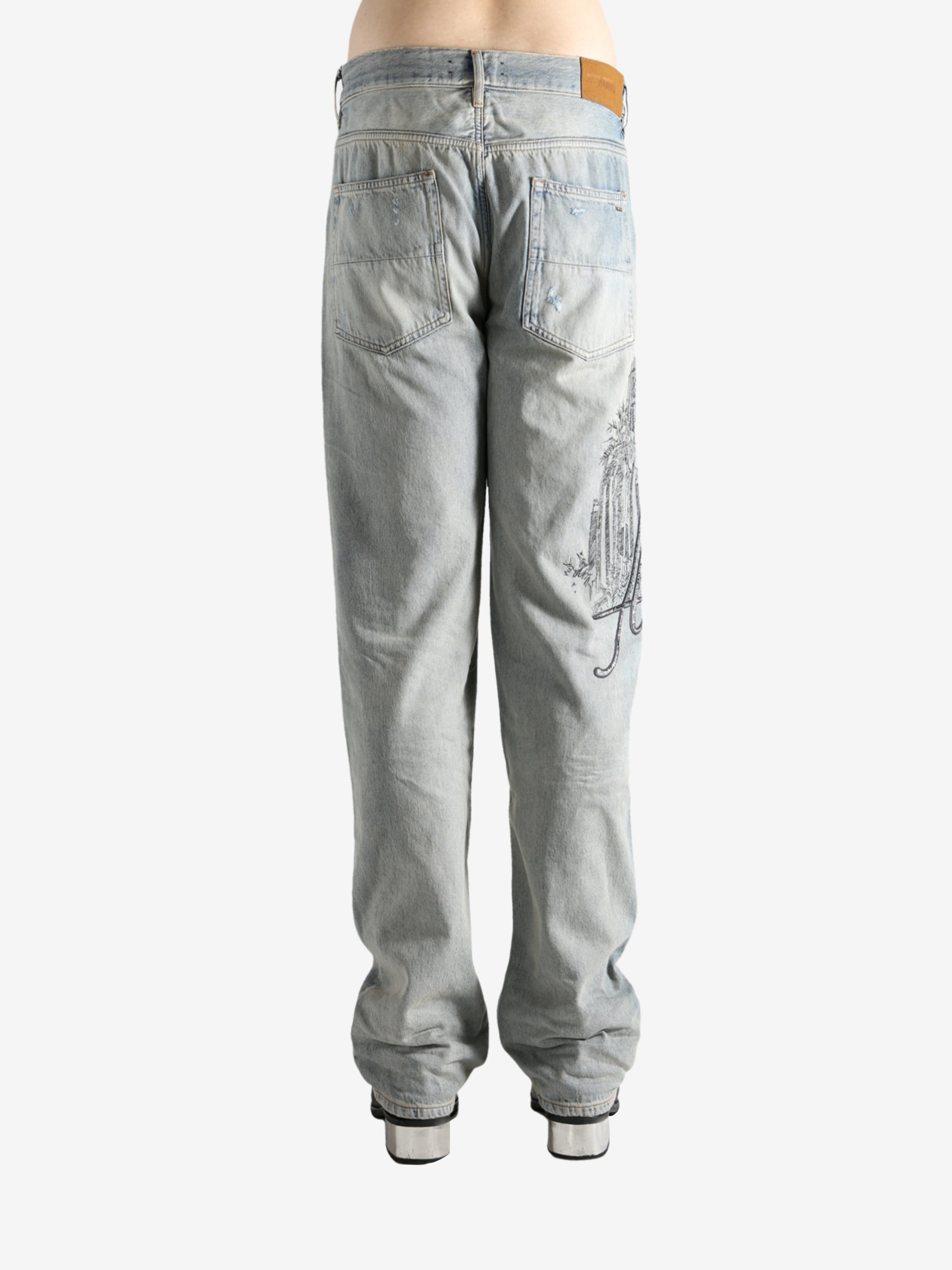 Blue jeans worn by a person, showing the jeans fit