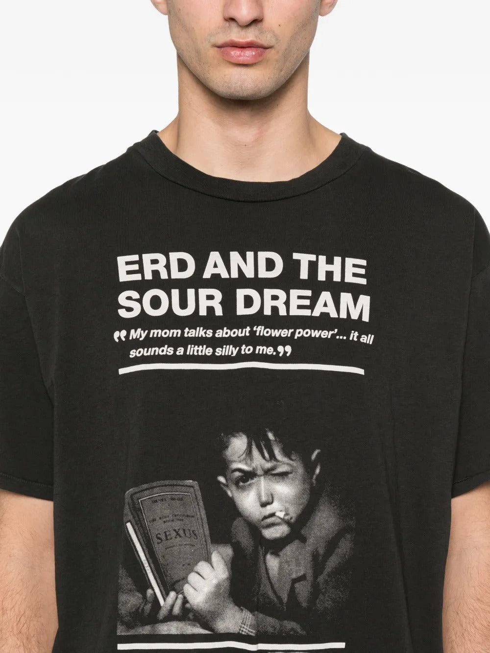 close up of black t-shirt, showing texture of the cotton fabric