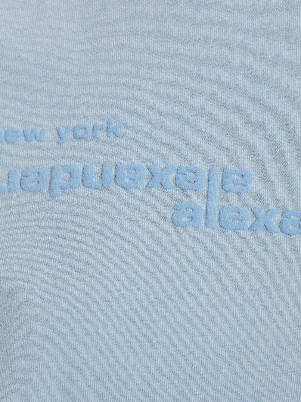 Close up of Blue top, showing texture of the 100% cotton fabric